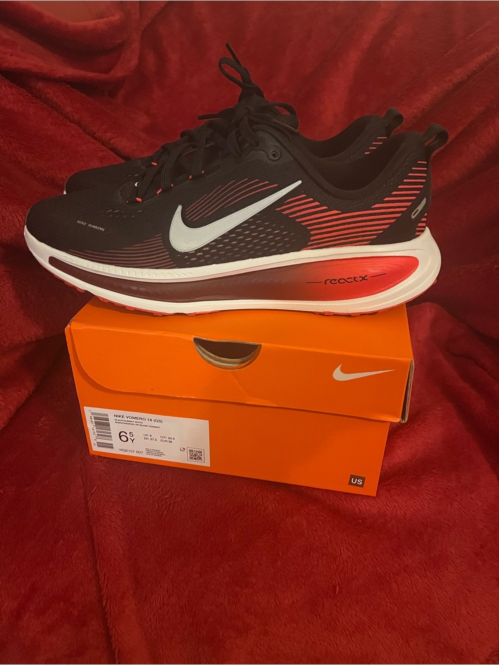 Nike Vomero 18 GS Running Shoes Black with Red Accents and White Swoosh
